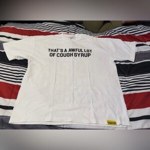 Graphic White Short Sleeve Tee with 'That's a Awful Lot of Cough Syrup'